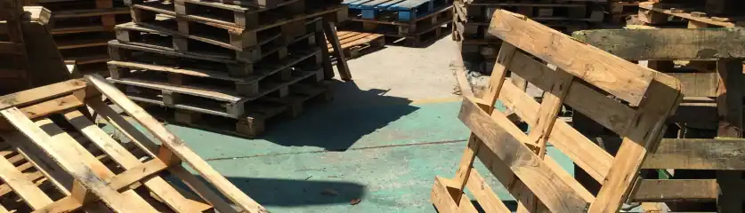 Pallet Kings used wooden pallets and shipping pallets in outdoor storage yard.
